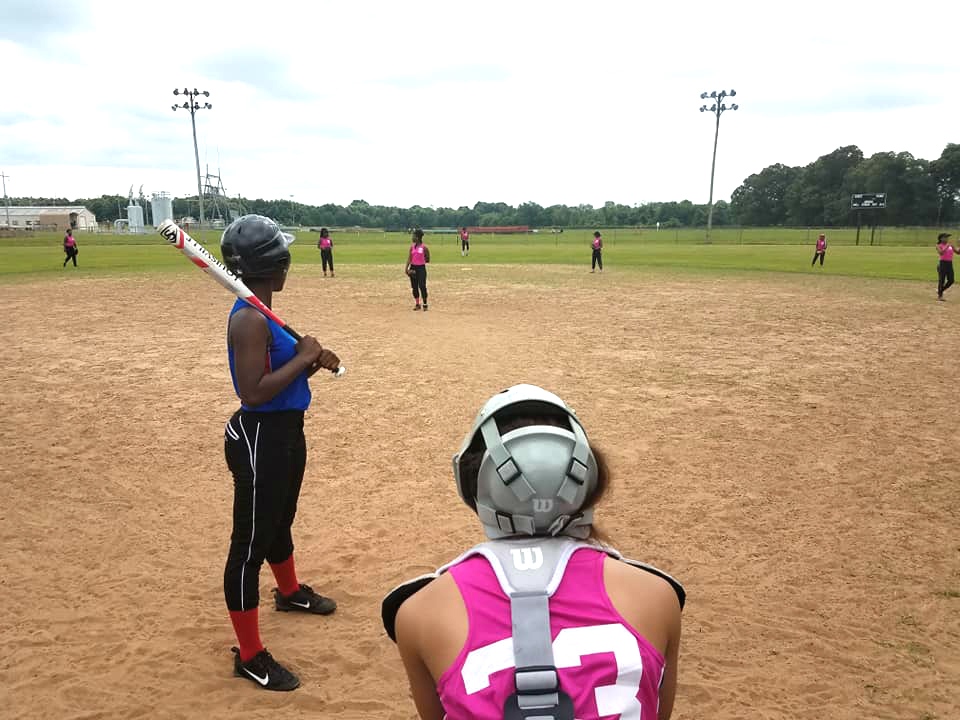 Girls playing softball